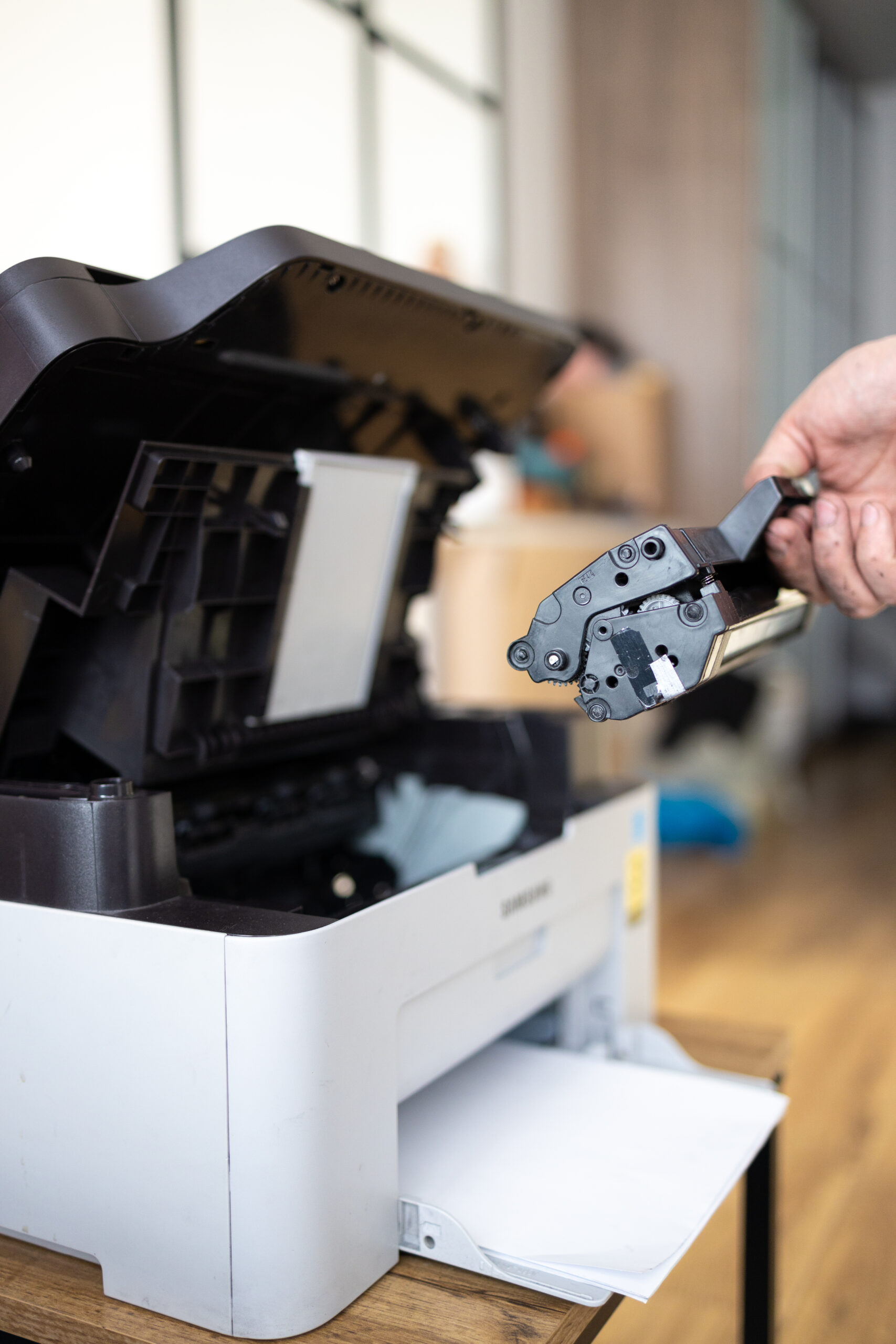 hands-repairing-laser-toner-cartridge-2025-03-13-00-01-29-utc